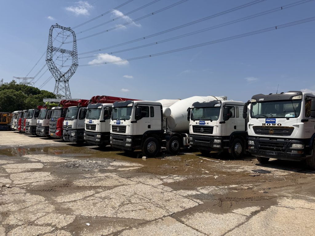 Premium used concrete machines at imachine storage yard, ready for global export